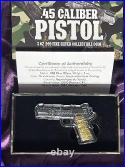 2024 Chad. 45 Caliber Pistol Gun Shaped Coin 2oz Silver ANTIQUED withGold Gilding