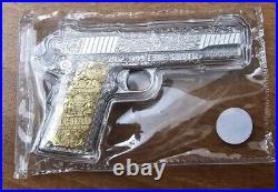 2024 Chad. 45 Caliber Pistol Gun Shaped Coin 2oz Silver ANTIQUED withGold Gilding