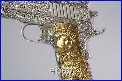 2024 Chad. 45 Caliber Pistol Gun Shaped Coin 2oz Silver ANTIQUED withGold Gilding