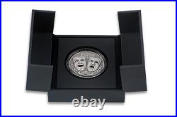 2025 Cameroon 2 oz Antiqued Silver Holed Mask Coin Comedy & Tragedy