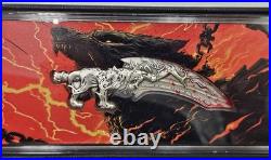 2025 Cameroon Fenrir's Fang 2 oz Antique. 999 Silver Shaped Coin UV Enamel