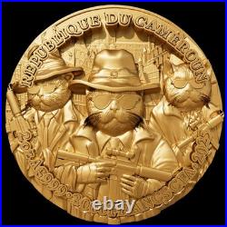 2025 Cameroon Gold Gild Meow Mafia UHR 2 oz Silver 11.5 oz Copper Coin UV EFFECT 2025 Cameroon Gold Gild Meow Mafia UHR 2 oz Silver 11.5 oz Copper Coin UV EFFECT