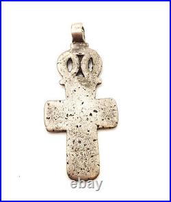 Antique Ethiopian Christian cross pendant made from a silver Maria Theresa coin