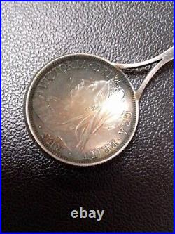 Antique or vintage Queen Victoria Rose Sterling Silver coin Spoon