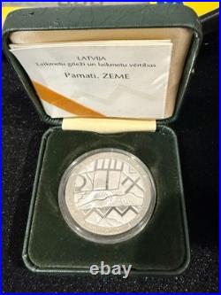 Latvia 1 Lats 2000. Earth. Silver With Certificate In Plastic Capsule And Box