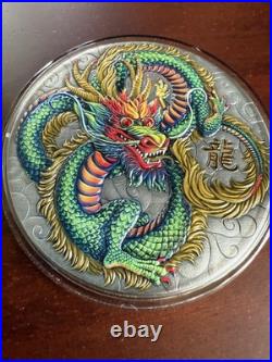 The Power of Green Dragon 5 oz Antique finish Silver Coin 10$ Niue 2024