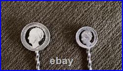 Unique Dutch Silver coin spoons 1940/1941 with Queen Wilhelmina